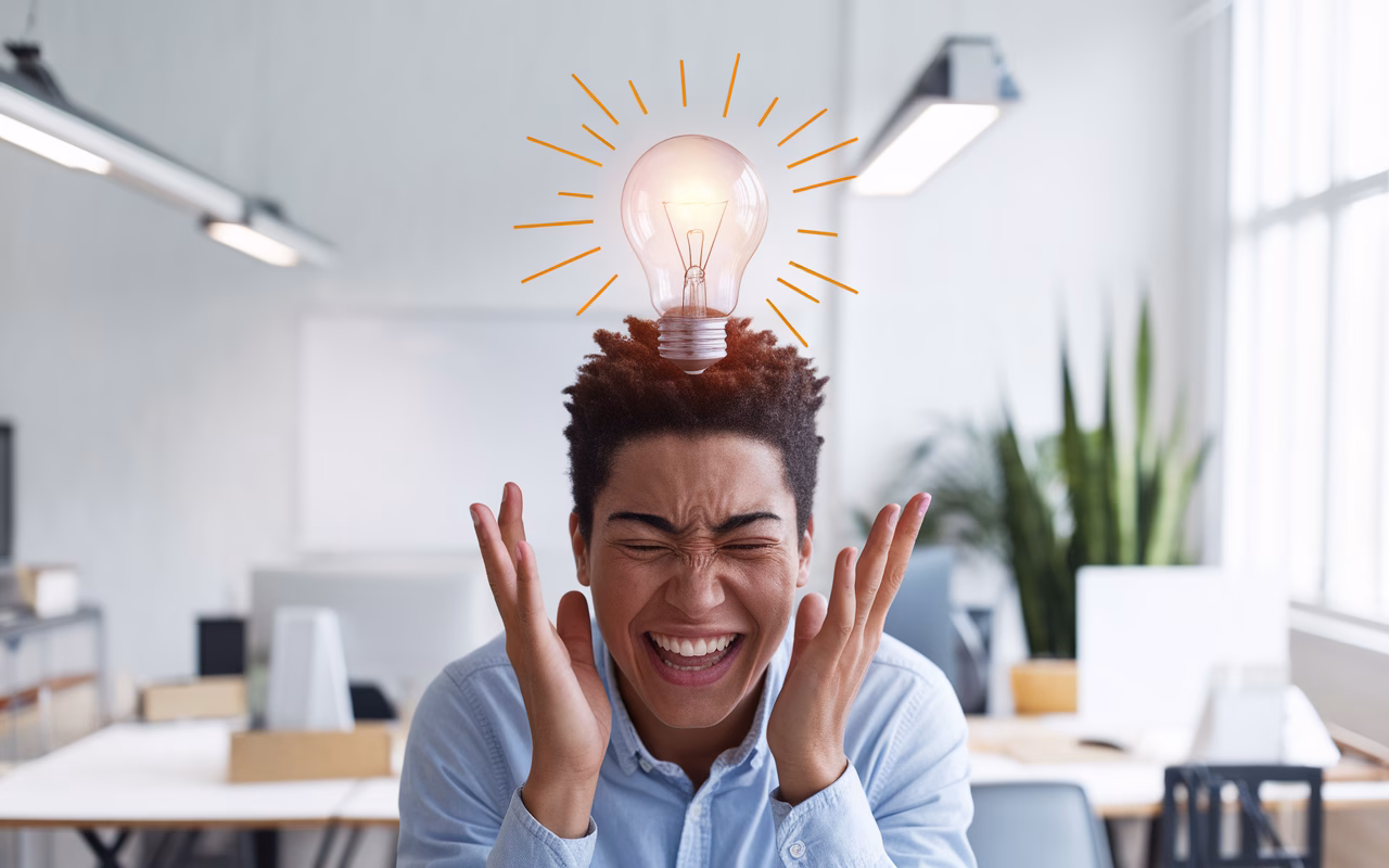 Eureka Moment in Creativity Person experiencing a breakthrough moment with lightbulb