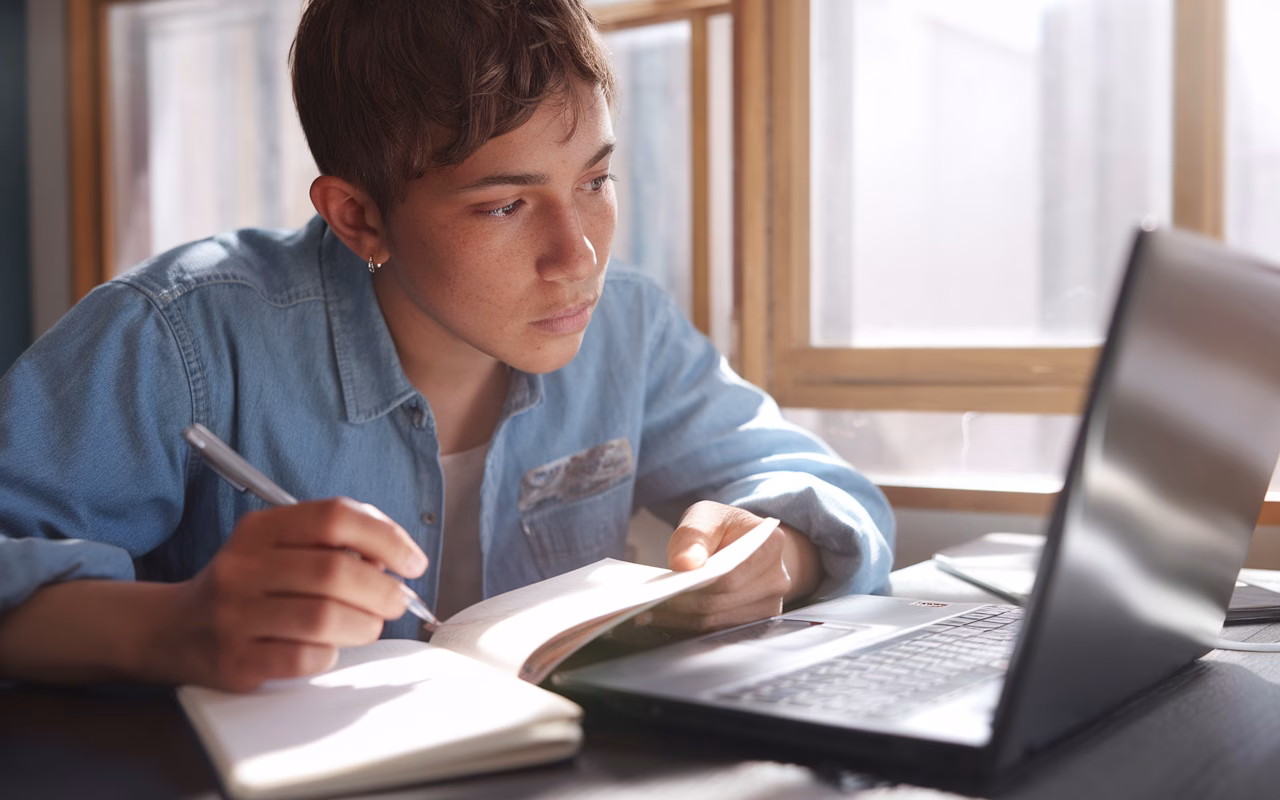 Monetizing Daily Questions Person thoughtfully considering a question and writing an answer
