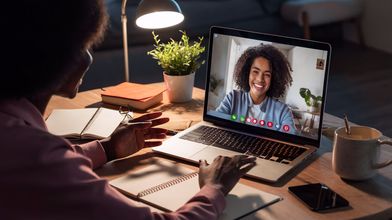 Client receiving online wellness coaching Remote coaching session at home
